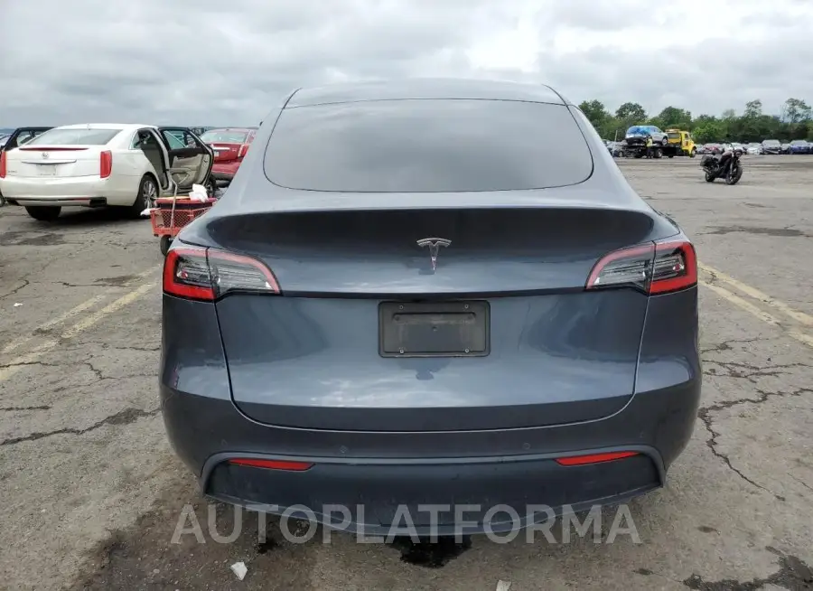 TESLA MODEL Y 2021 vin 5YJYGDED4MF103883 from auto auction Copart