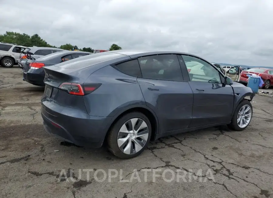 TESLA MODEL Y 2021 vin 5YJYGDED4MF103883 from auto auction Copart