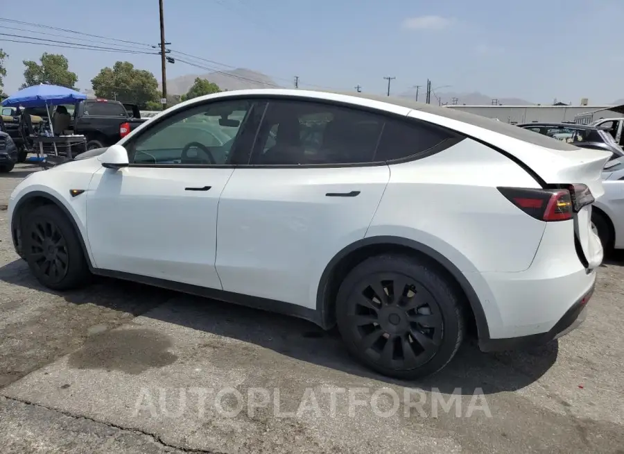 TESLA MODEL Y 2023 vin 7SAYGAEE0PF586447 from auto auction Copart