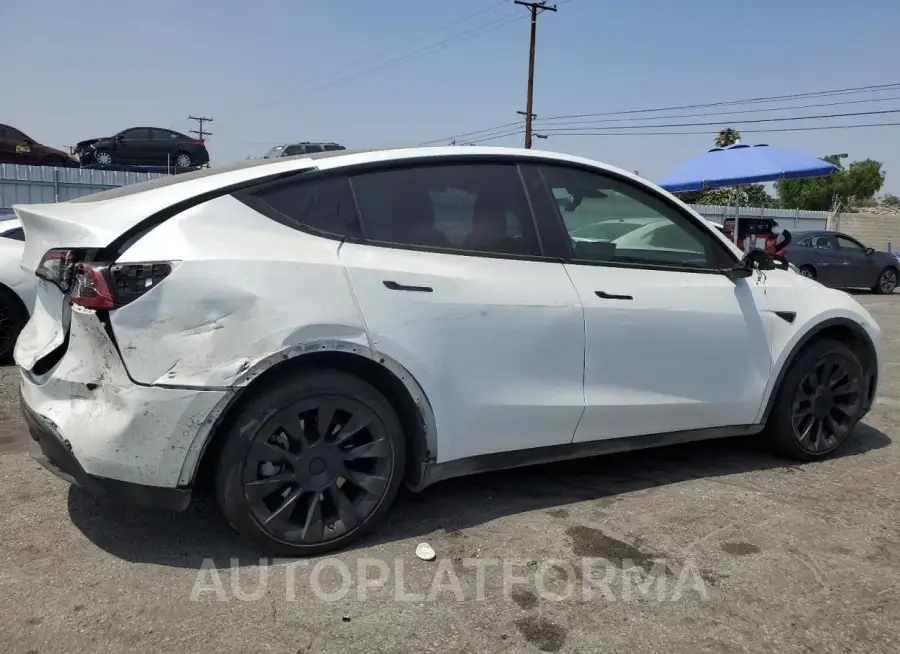 TESLA MODEL Y 2023 vin 7SAYGAEE0PF586447 from auto auction Copart