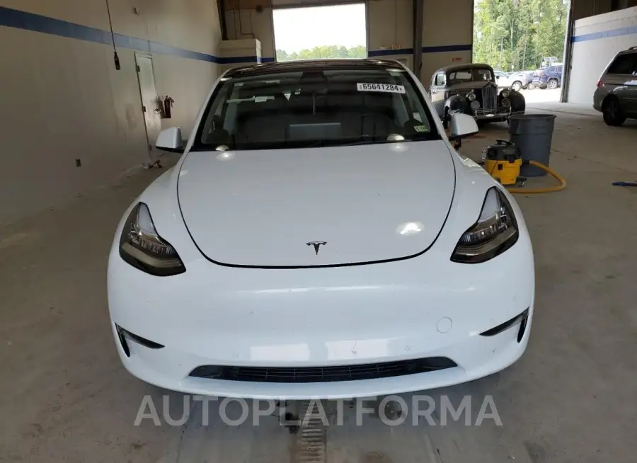 TESLA MODEL Y 2022 vin 7SAYGDEE0NF310591 from auto auction Copart