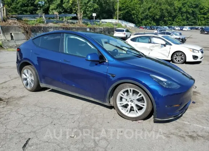 TESLA MODEL Y 2023 vin 7SAYGDEE2PF598181 from auto auction Copart