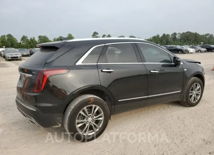 CADILLAC XT5 PREMIU 2021 vin 1GYKNCRS3MZ177962 from auto auction Copart