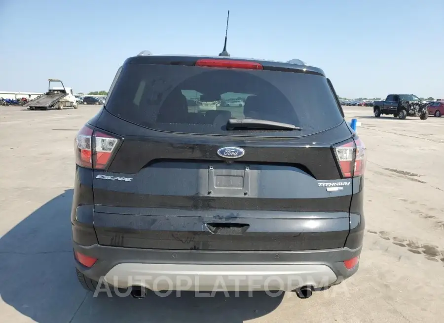 FORD ESCAPE TIT 2018 vin 1FMCU9J92JUB82972 from auto auction Copart