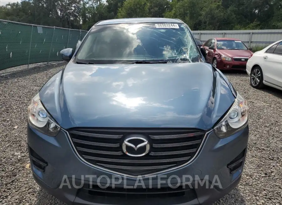 MAZDA cx-5 sport 2016 vin JM3KE2BY1G0793979 from auto auction Copart