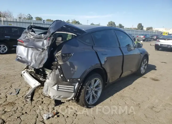 TESLA MODEL Y 2023 vin 7SAYGDEE2PF685711 from auto auction Copart