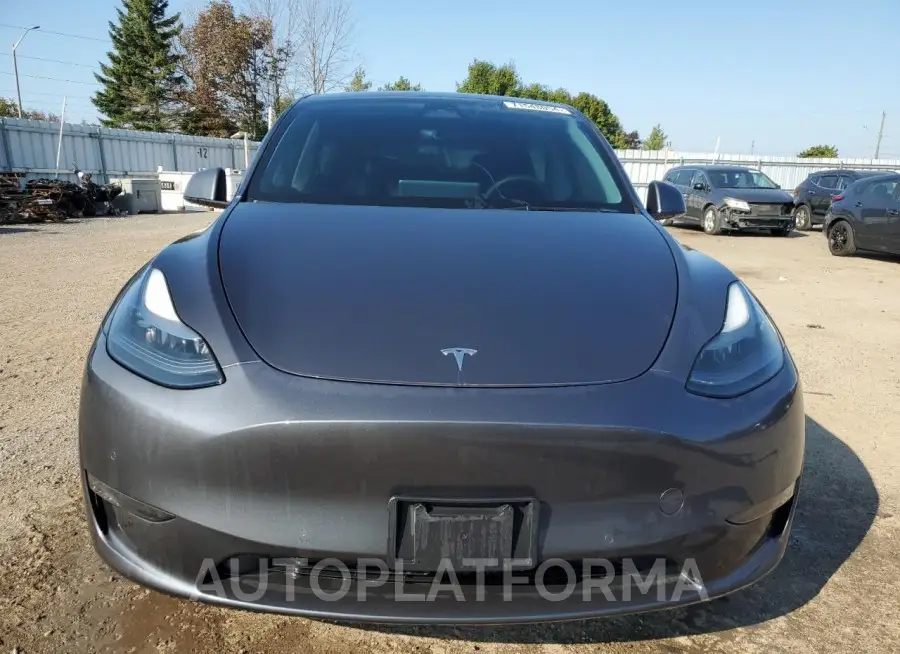 TESLA MODEL Y 2022 vin 7SAYGDEF3NF521115 from auto auction Copart