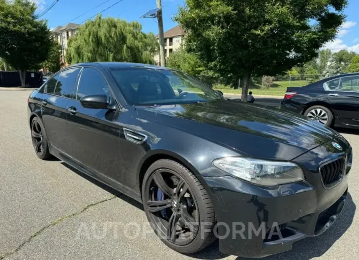 BMW M5 2015 vin WBSFV9C56FD595096 from auto auction Copart