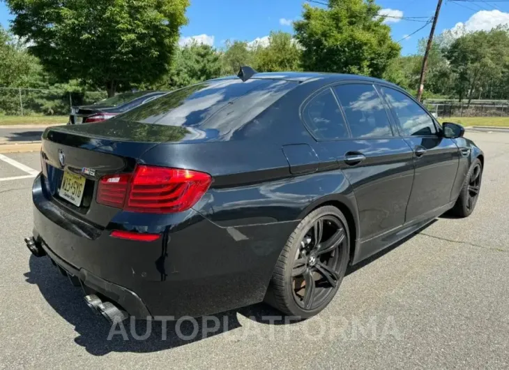 BMW M5 2015 vin WBSFV9C56FD595096 from auto auction Copart