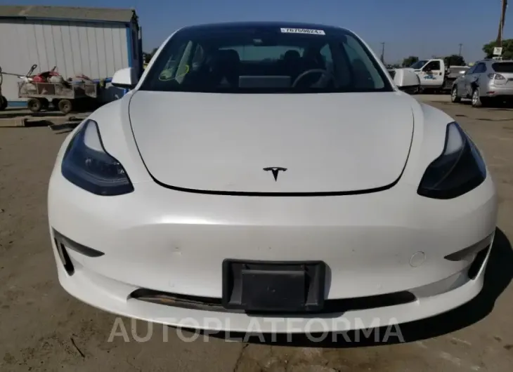 TESLA MODEL 3 2021 vin 5YJ3E1EAXMF028143 from auto auction Copart