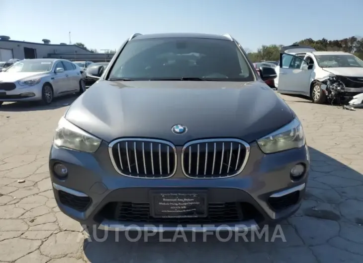 BMW X1 XDRIVE2 2018 vin WBXHT3C34J5K30049 from auto auction Copart