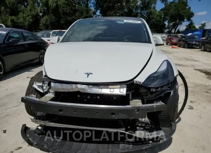 TESLA MODEL Y 2023 vin 7SAYGDEE0PF782177 from auto auction Copart