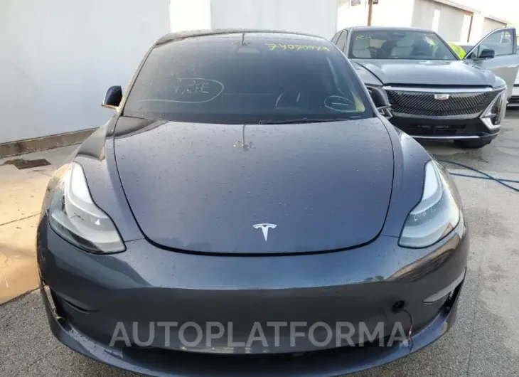 TESLA 3 2023 vin 5YJ3E1EC2PF489682 from auto auction Copart