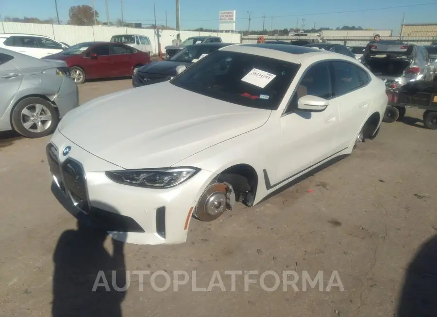 BMW I4 2023 vin WBY43AW04PFR38790 from auto auction Iaai