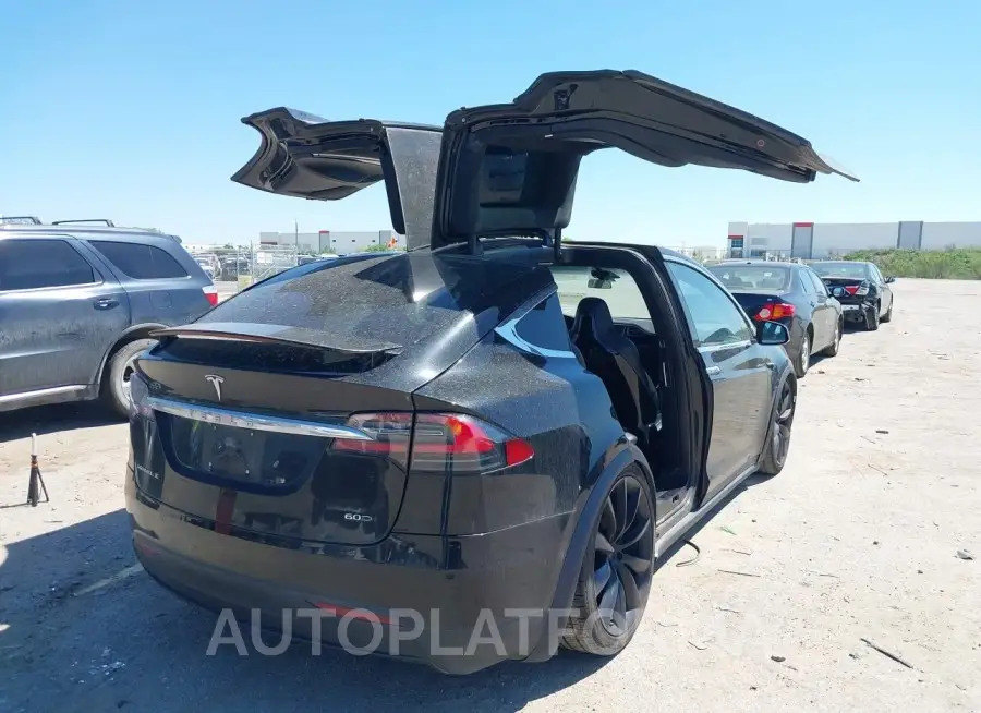 TESLA MODEL X 2016 vin 5YJXCBE21GF023813 from auto auction Iaai