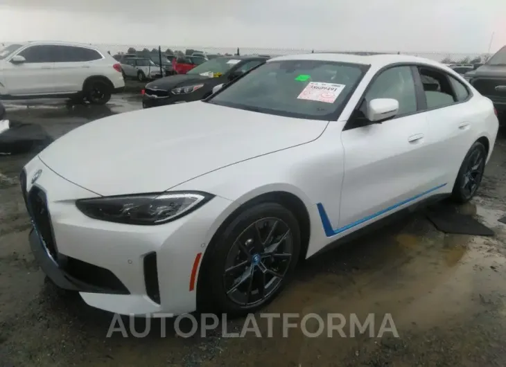 BMW I4 2023 vin WBY43AW02PFR42109 from auto auction Iaai