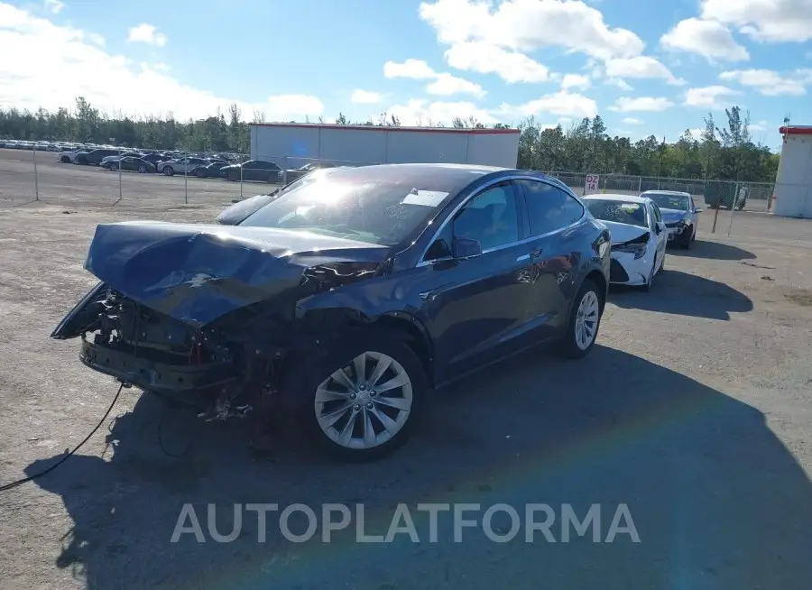 TESLA MODEL X 2020 vin 5YJXCDE25LF300162 from auto auction Iaai