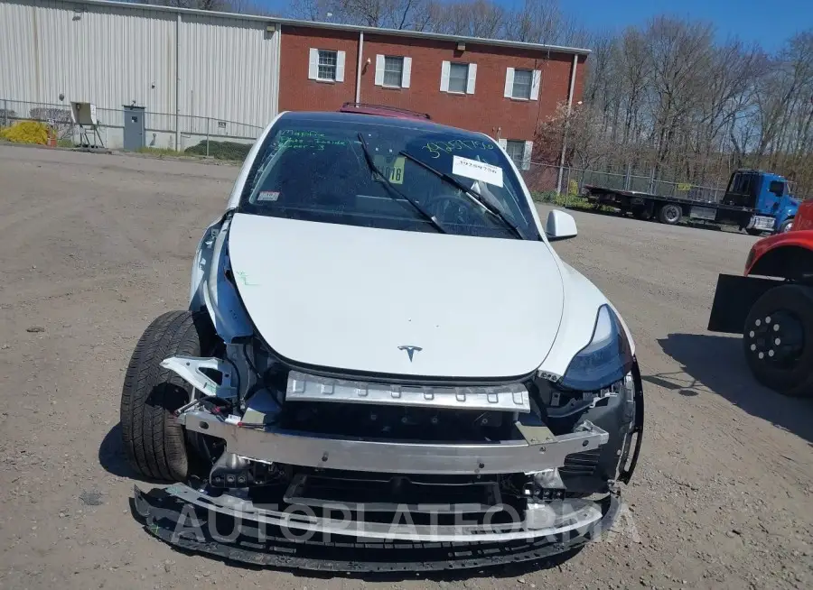 TESLA MODEL Y 2023 vin 7SAYGDEEXPF875644 from auto auction Iaai