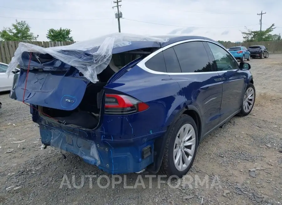 TESLA MODEL X 2018 vin 5YJXCBE21JF140167 from auto auction Iaai