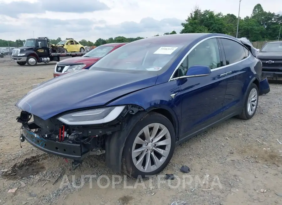 TESLA MODEL X 2018 vin 5YJXCBE21JF140167 from auto auction Iaai