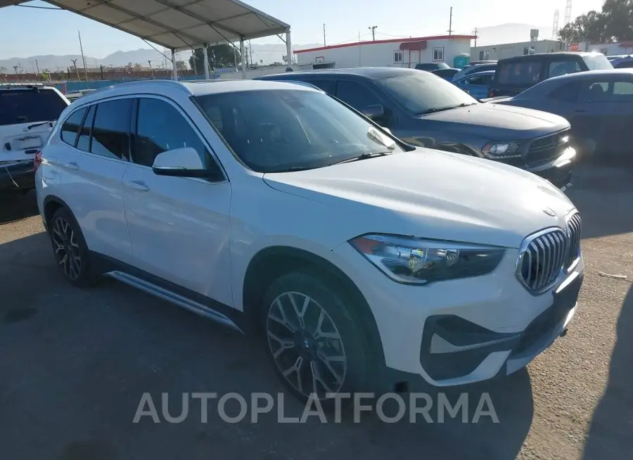 BMW X1 2021 vin WBXJG7C04M5S61566 from auto auction Iaai