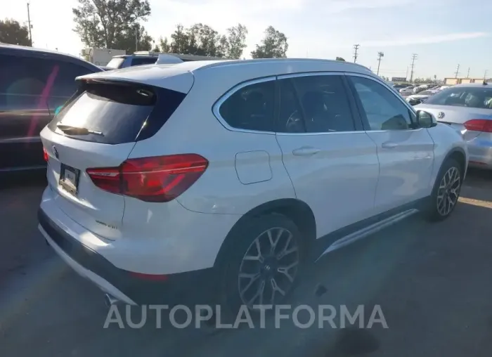 BMW X1 2021 vin WBXJG7C04M5S61566 from auto auction Iaai