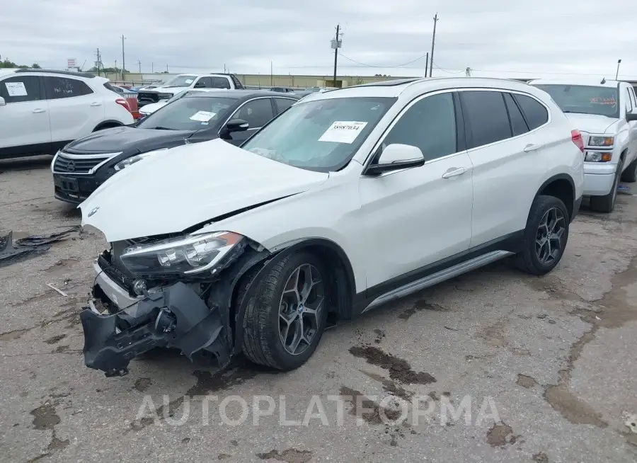 BMW X1 2019 vin WBXHU7C57K5L10789 from auto auction Iaai