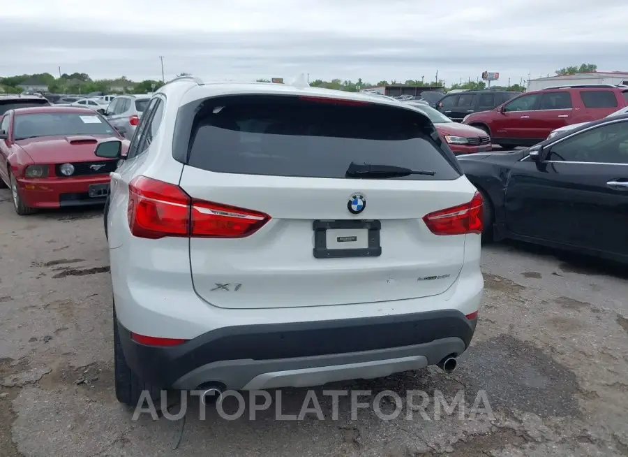 BMW X1 2019 vin WBXHU7C57K5L10789 from auto auction Iaai