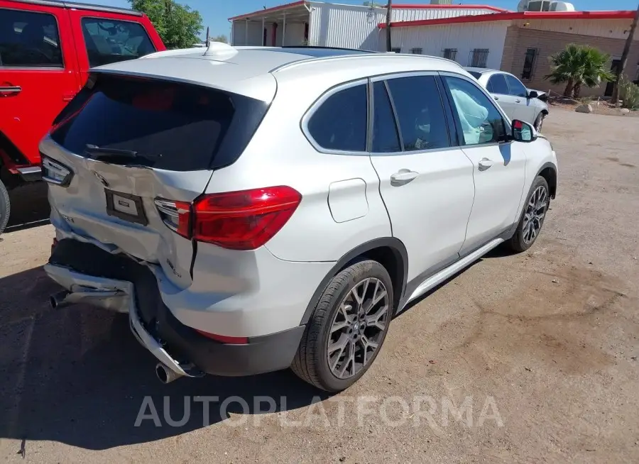 BMW X1 2021 vin WBXJG7C00M5U25847 from auto auction Iaai