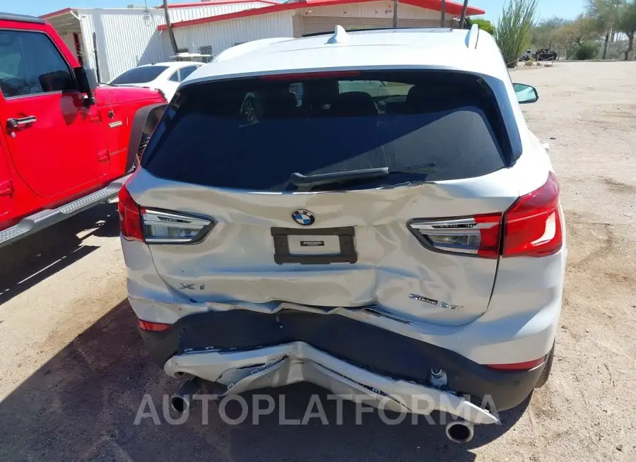 BMW X1 2021 vin WBXJG7C00M5U25847 from auto auction Iaai