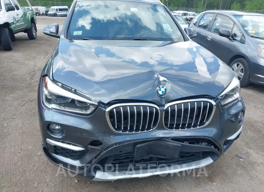 BMW X1 2019 vin WBXHT3C55K3H36376 from auto auction Iaai