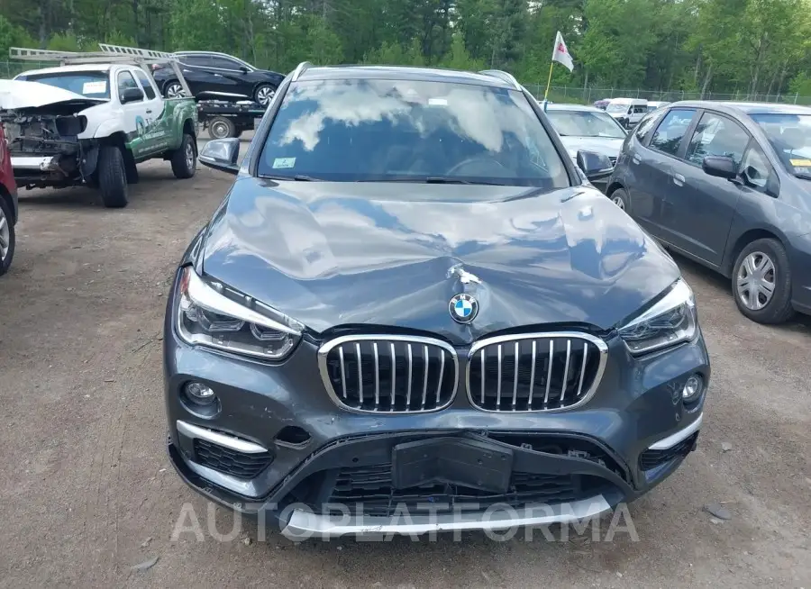 BMW X1 2019 vin WBXHT3C55K3H36376 from auto auction Iaai