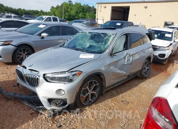 BMW X1 2019 vin WBXHT3C52K5L35580 from auto auction Iaai