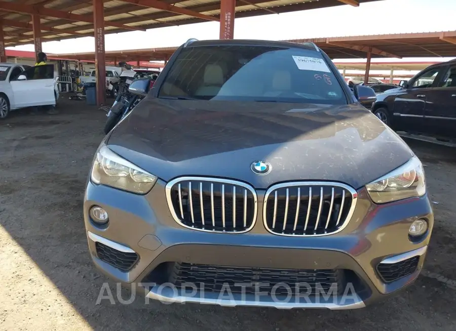 BMW X1 2018 vin WBXHU7C32J5H38964 from auto auction Iaai