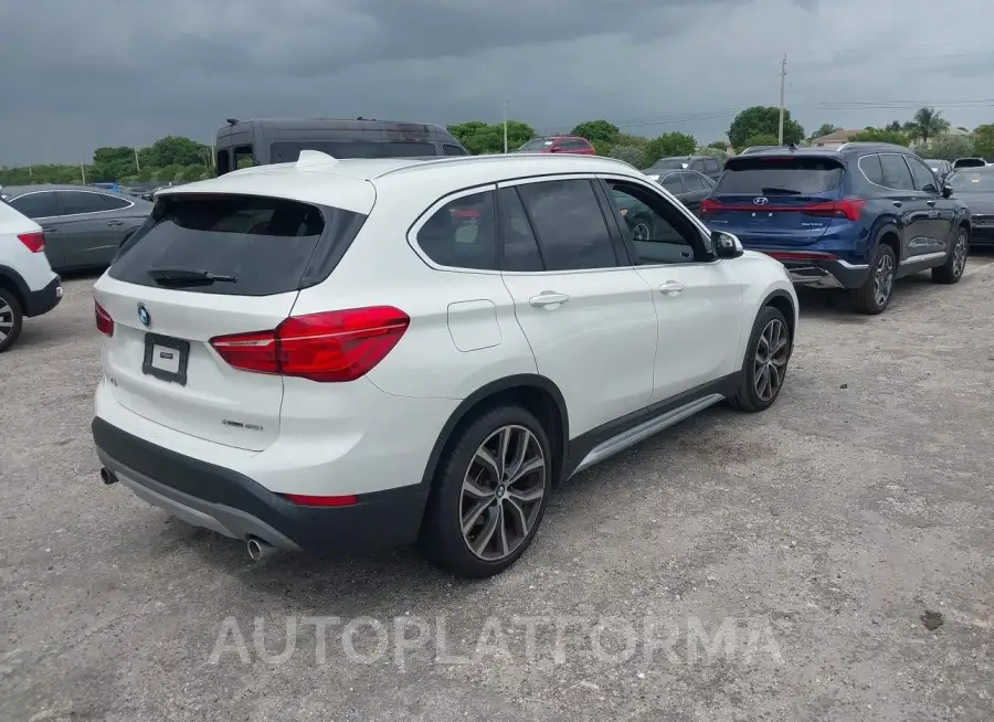 BMW X1 2019 vin WBXHU7C50K5L11718 from auto auction Iaai