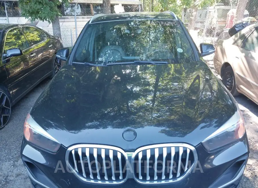 BMW X1 2021 vin WBXJG7C00M5T72938 from auto auction Iaai