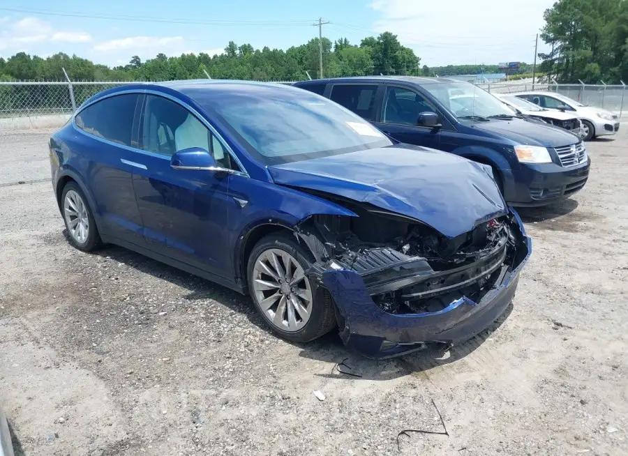 TESLA MODEL X 2018 vin 5YJXCBE21JF139407 from auto auction Iaai