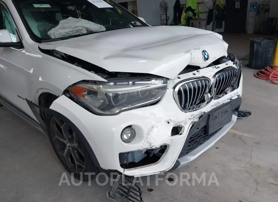 BMW X1 2017 vin WBXHT3C32H5F80714 from auto auction Iaai