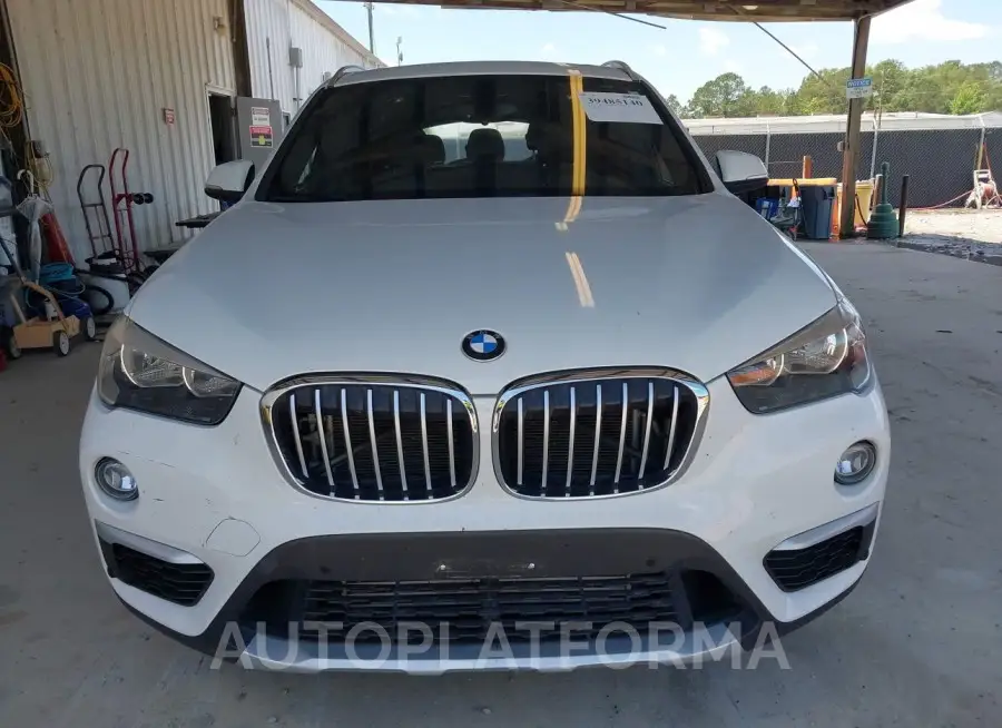 BMW X1 2018 vin WBXHT3C38J5L31076 from auto auction Iaai