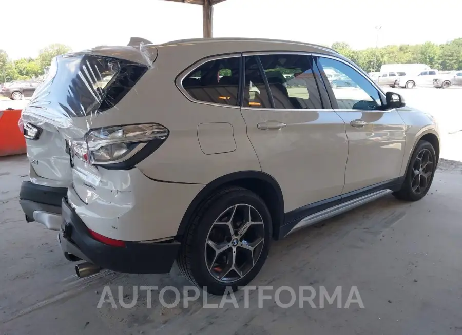 BMW X1 2018 vin WBXHT3C38J5L31076 from auto auction Iaai