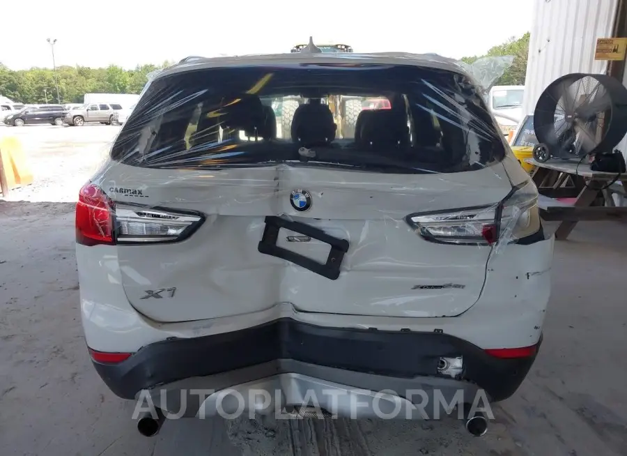 BMW X1 2018 vin WBXHT3C38J5L31076 from auto auction Iaai