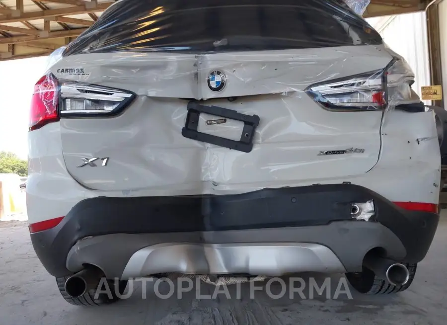 BMW X1 2018 vin WBXHT3C38J5L31076 from auto auction Iaai