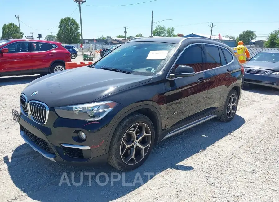 BMW X1 2018 vin WBXHT3C32J5K25089 from auto auction Iaai