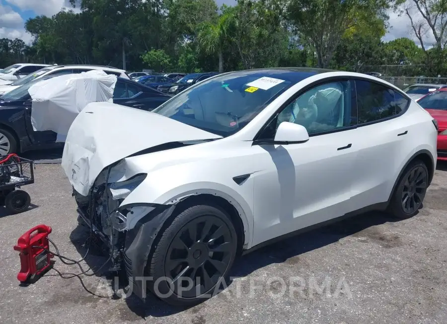 TESLA MODEL Y 2022 vin 7SAYGDEE0NF358091 from auto auction Iaai