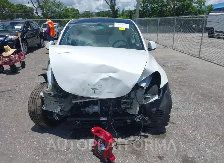 TESLA MODEL Y 2022 vin 7SAYGDEE0NF358091 from auto auction Iaai