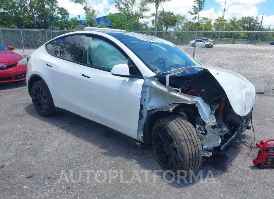 TESLA MODEL Y 2022 vin 7SAYGDEE0NF358091 from auto auction Iaai