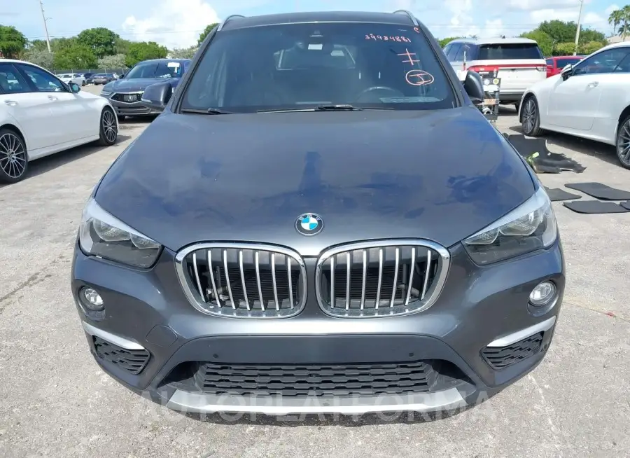 BMW X1 2019 vin WBXHU7C53K3H45744 from auto auction Iaai