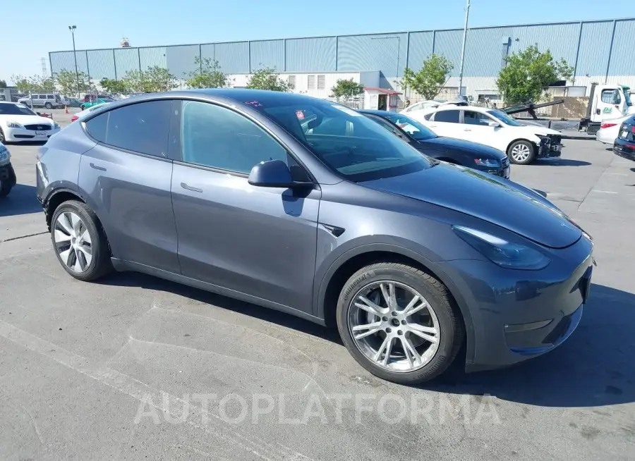 TESLA MODEL Y 2023 vin 7SAYGAEE9PF738841 from auto auction Iaai