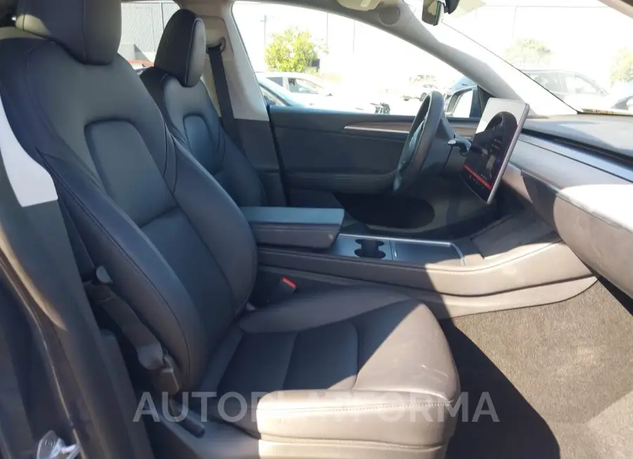 TESLA MODEL Y 2023 vin 7SAYGAEE9PF738841 from auto auction Iaai