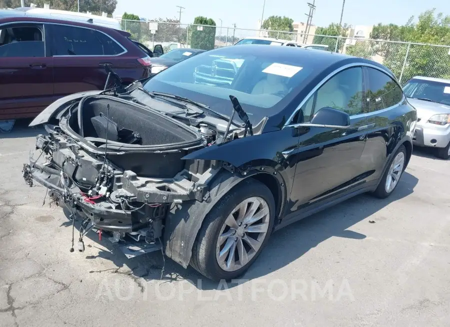 TESLA MODEL X 2020 vin 5YJXCDE2XLF305177 from auto auction Iaai